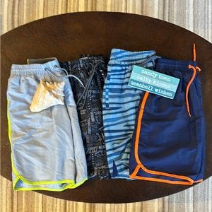 Nike Swim- 4 pairs of Nike swim trunks